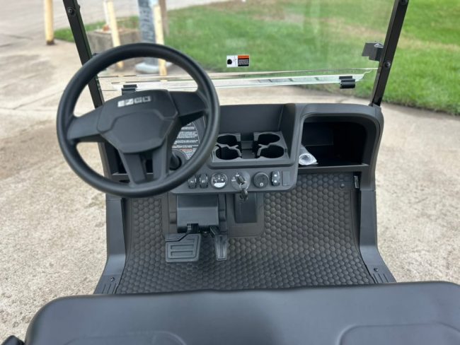 5262E733-AFA8-4529-AAE2-2A4C3EB91C67_1_105_c White E-Z-Go Cart Interior