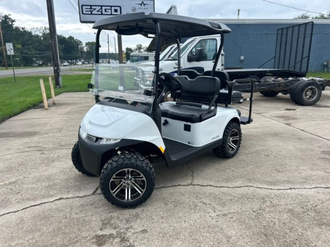 D39B87F3-71A8-43A8-BA6F-9E0BB4AD3E85_1_105_c White E-Z-Go Cart