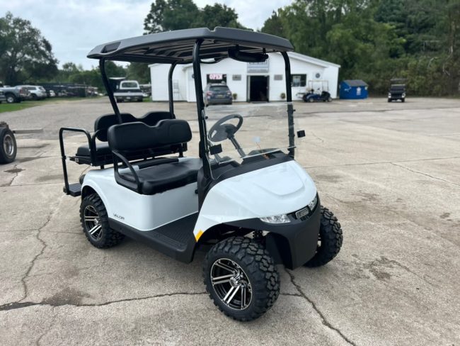 D83AF249-1243-430B-AC3D-660C6AF07A06_1_105_c White E-Z-Go Cart